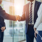 business people shaking hands